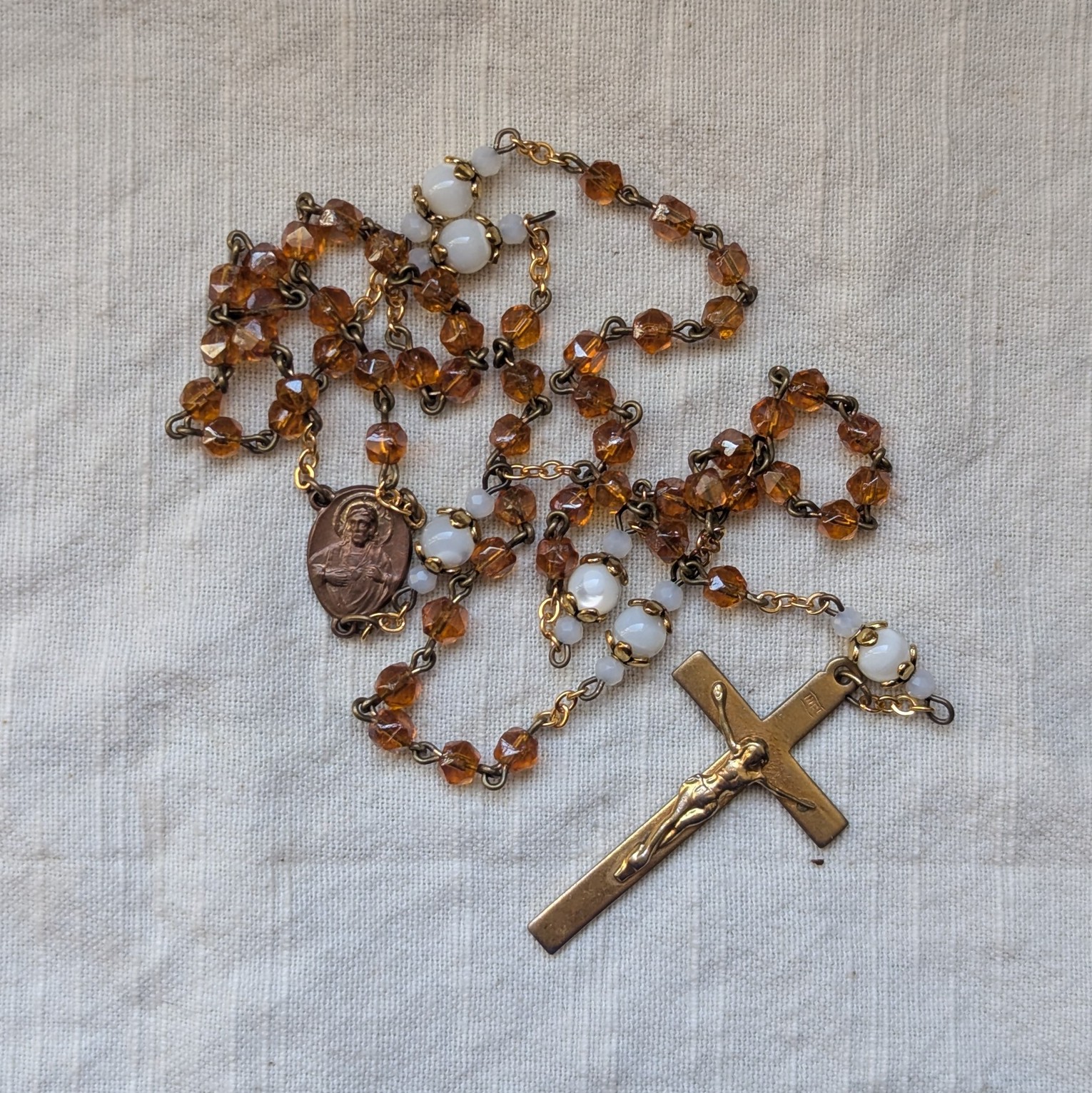 orange and ivory glass rosary