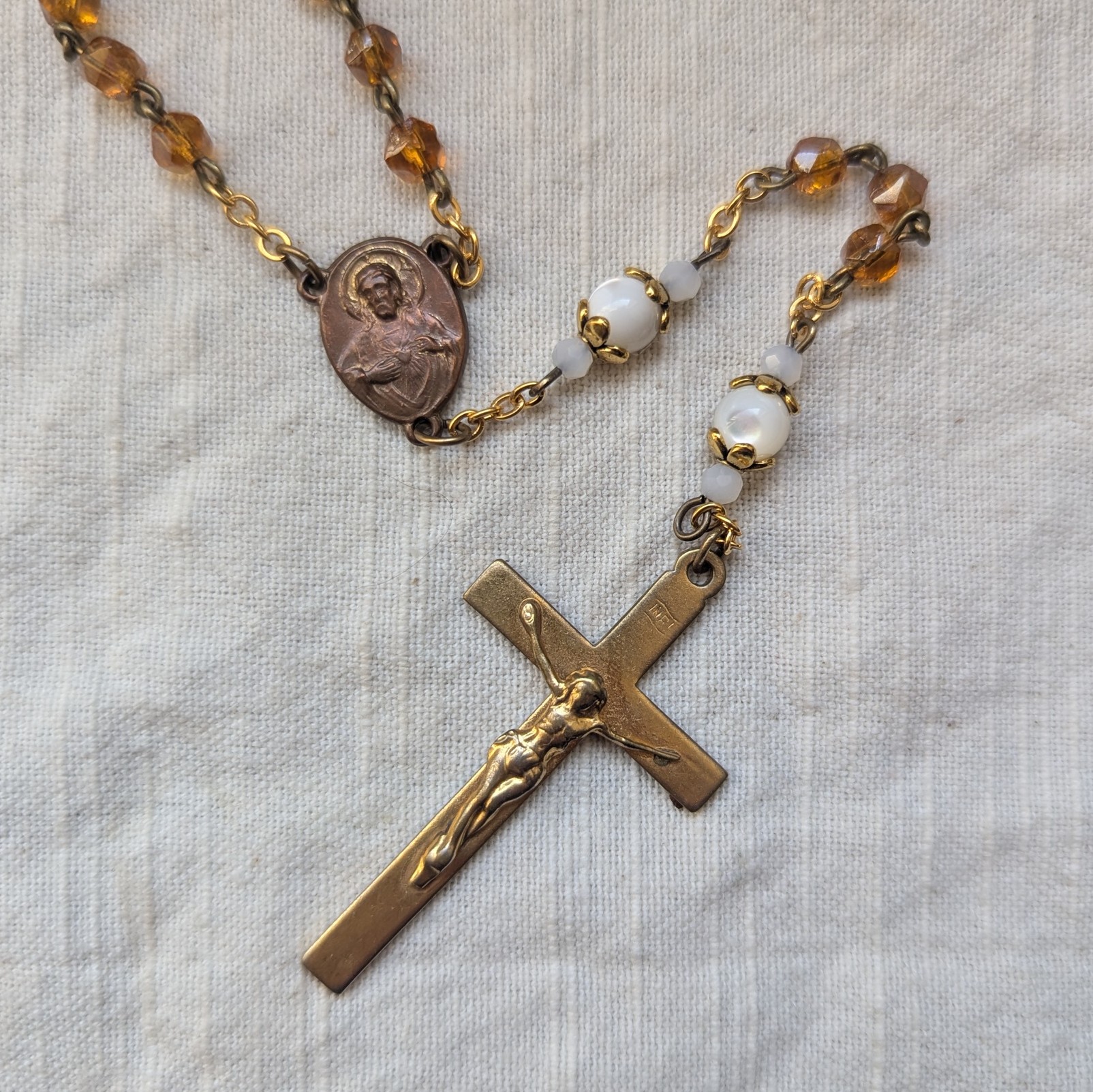 orange and ivory glass rosary