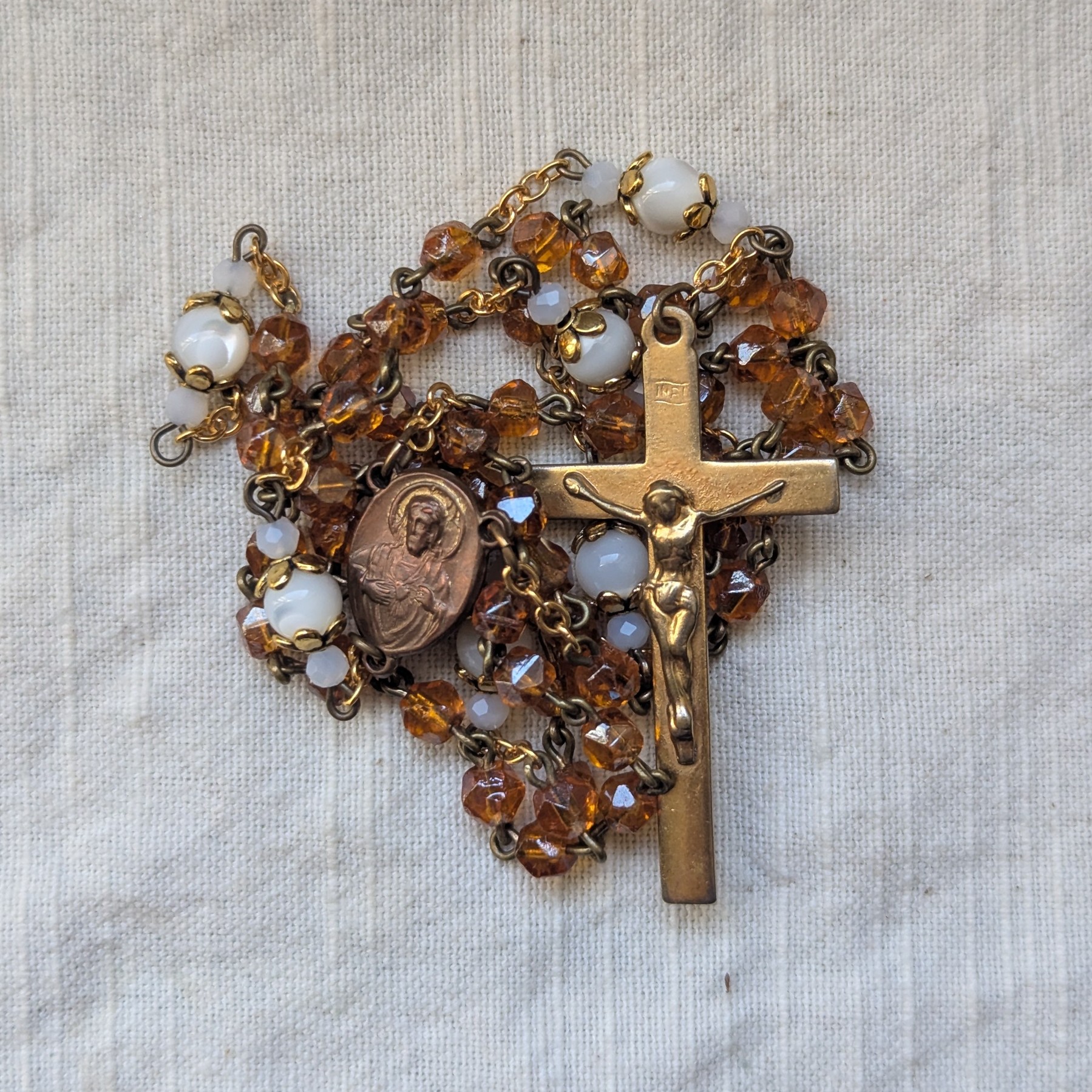 orange and ivory glass rosary