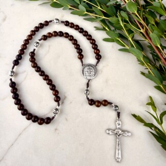 holy face rosary with green leaves